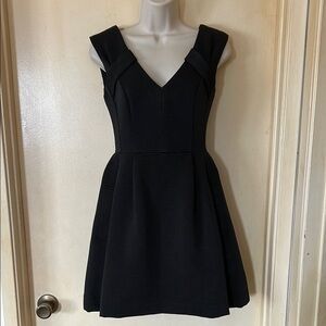 Nanette Lepore black cocktail dress with pockets size 0